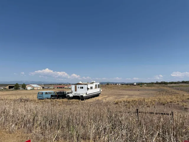 a view of a lake and mountain in the back
