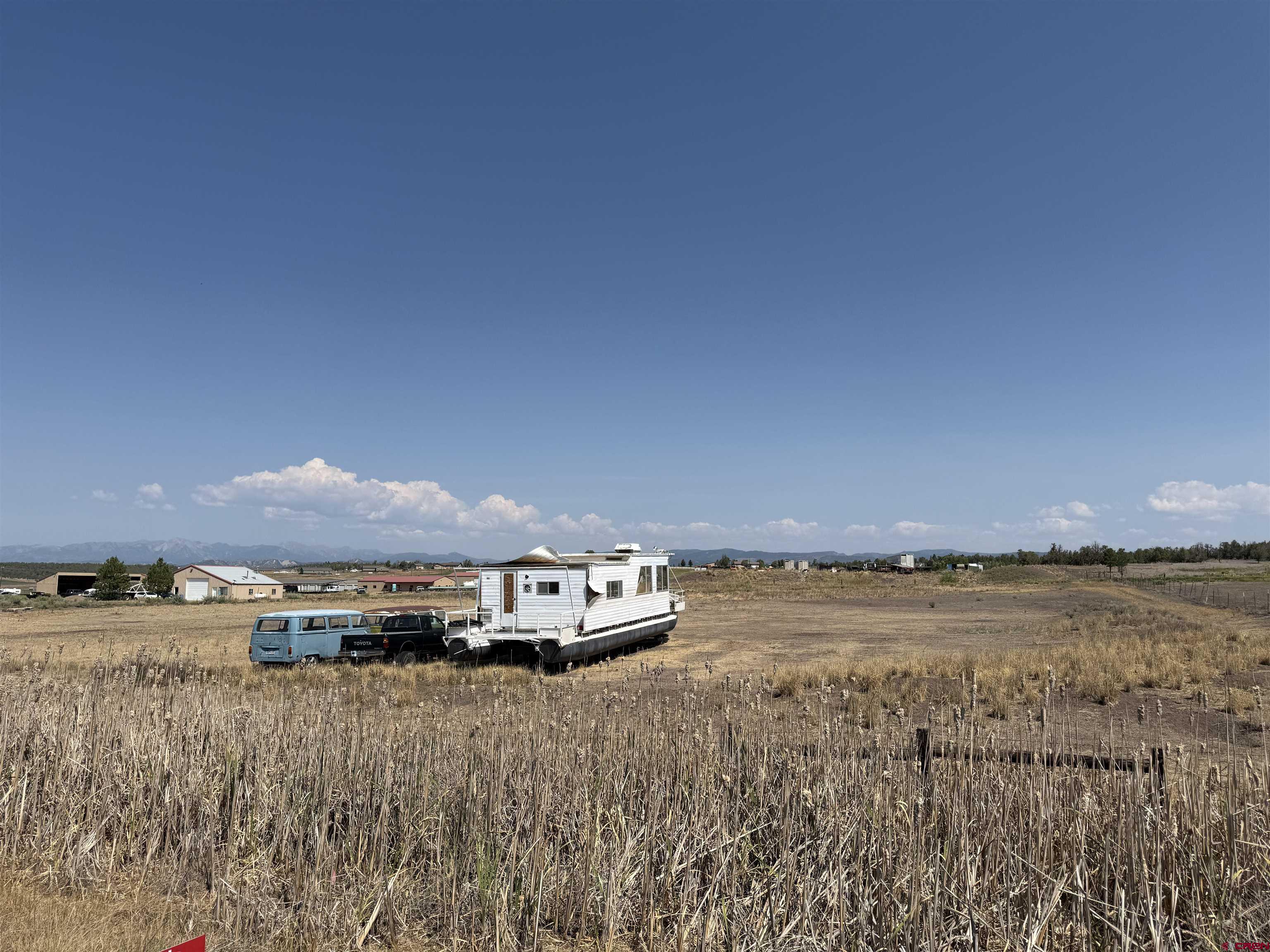 104 Chicken Hawk Lane Ignacio, CO 81137 - Photo 3 of 9 a view of a lake and mountain in the back