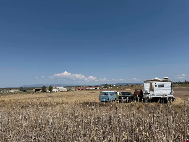 a view of a street with an ocean view