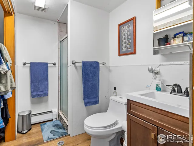 a view of walk in closet and bedroom view