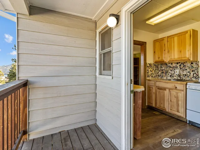 a kitchen with a stove and a refrigerator