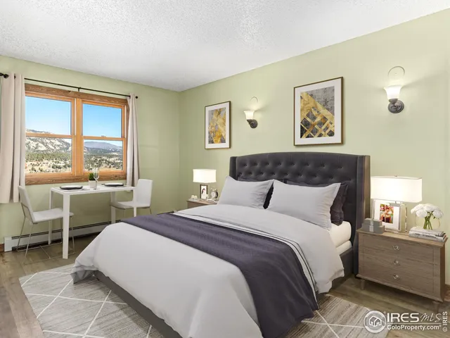 a dining room with furniture and a window