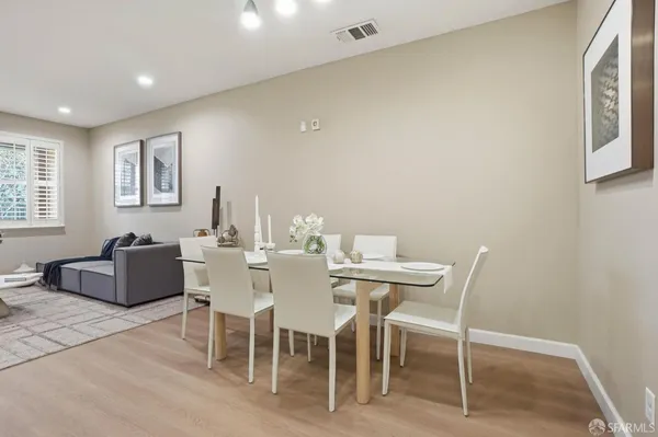 a view of a dining room with furniture