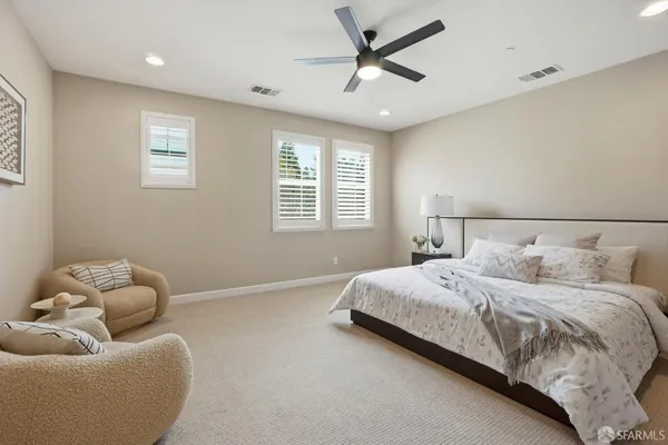 a bedroom with a bed and furniture