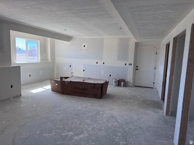 5777 West 4100 South Hooper, UT 84315 - Photo 28 of 41 Interior space featuring a textured ceiling