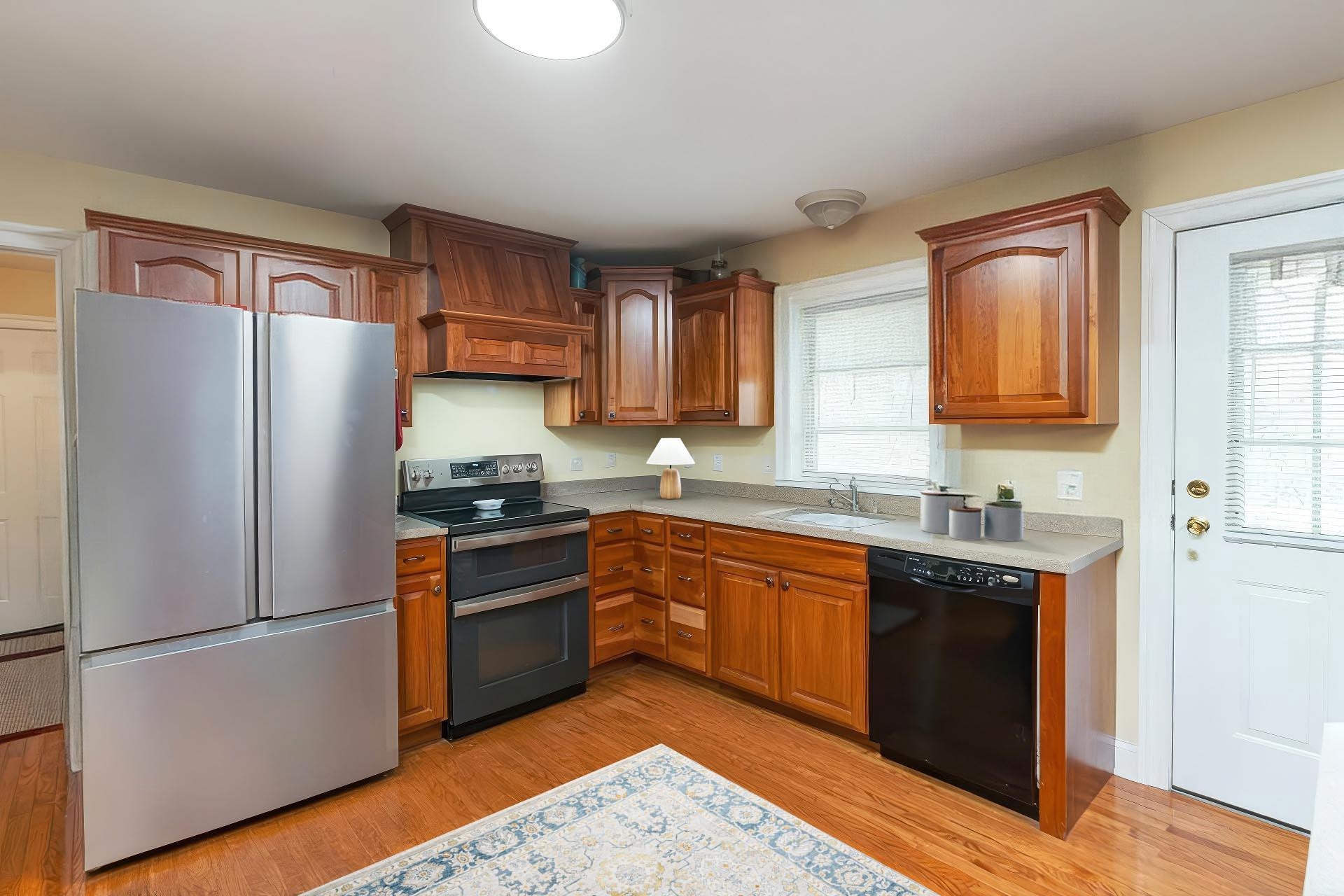 86 Spitler Circle Greenville, VA 24440 - Photo 3 of 25 a kitchen with granite countertop stainless steel appliances a refrigerator and a sink