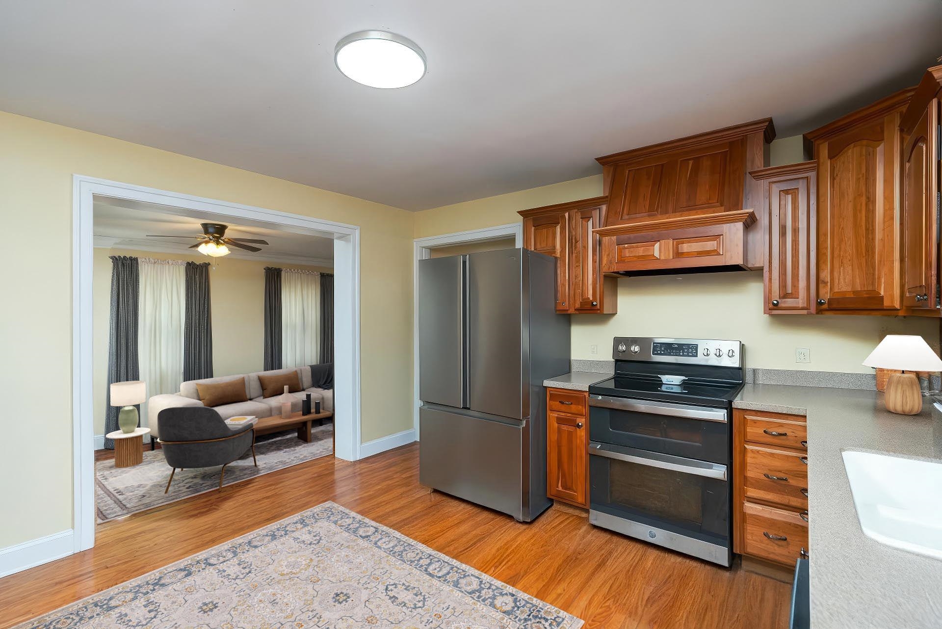 86 Spitler Circle Greenville, VA 24440 - Photo 4 of 25 a kitchen with stainless steel appliances granite countertop a refrigerator stove top oven and sink