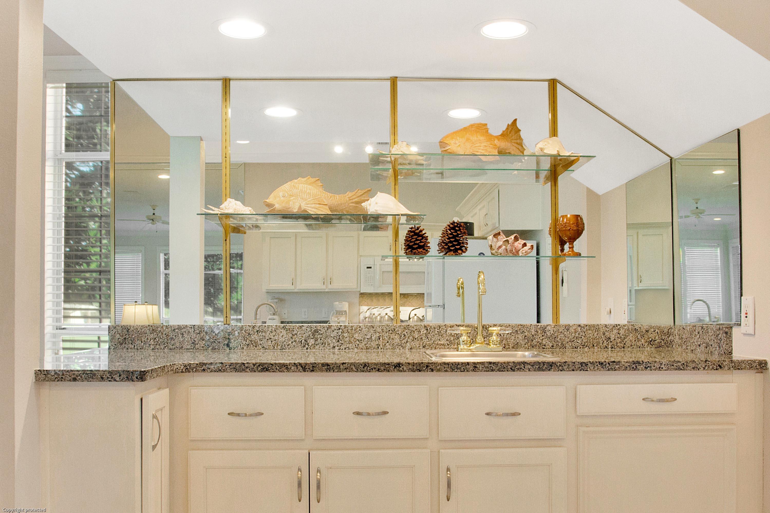 71 Vantage Point Miramar Beach, FL 32550 - Photo 11 of 36 a bathroom with a granite countertop sink and a mirror