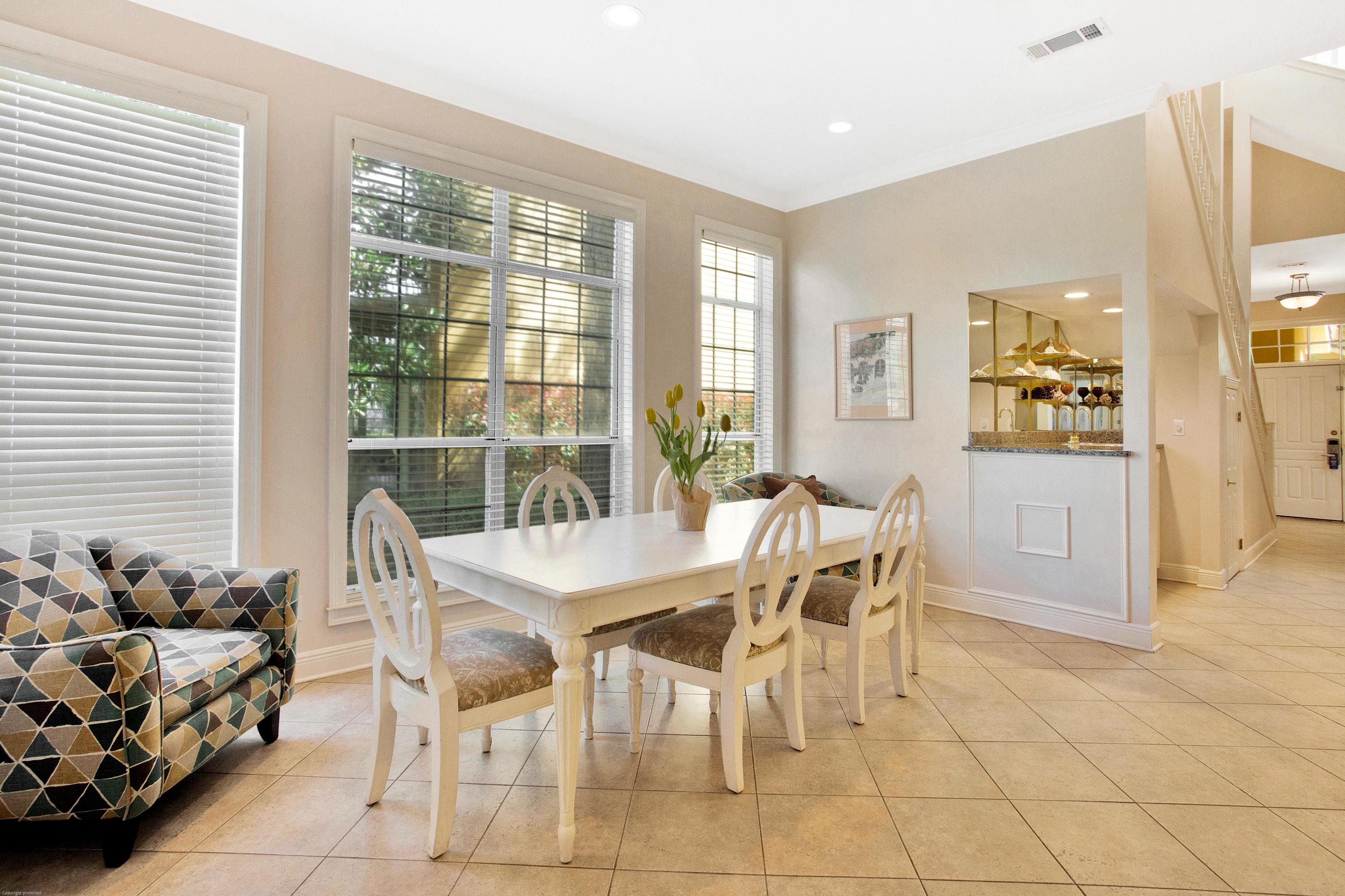 71 Vantage Point Miramar Beach, FL 32550 - Photo 12 of 36 a view of a dining room with furniture and a large window