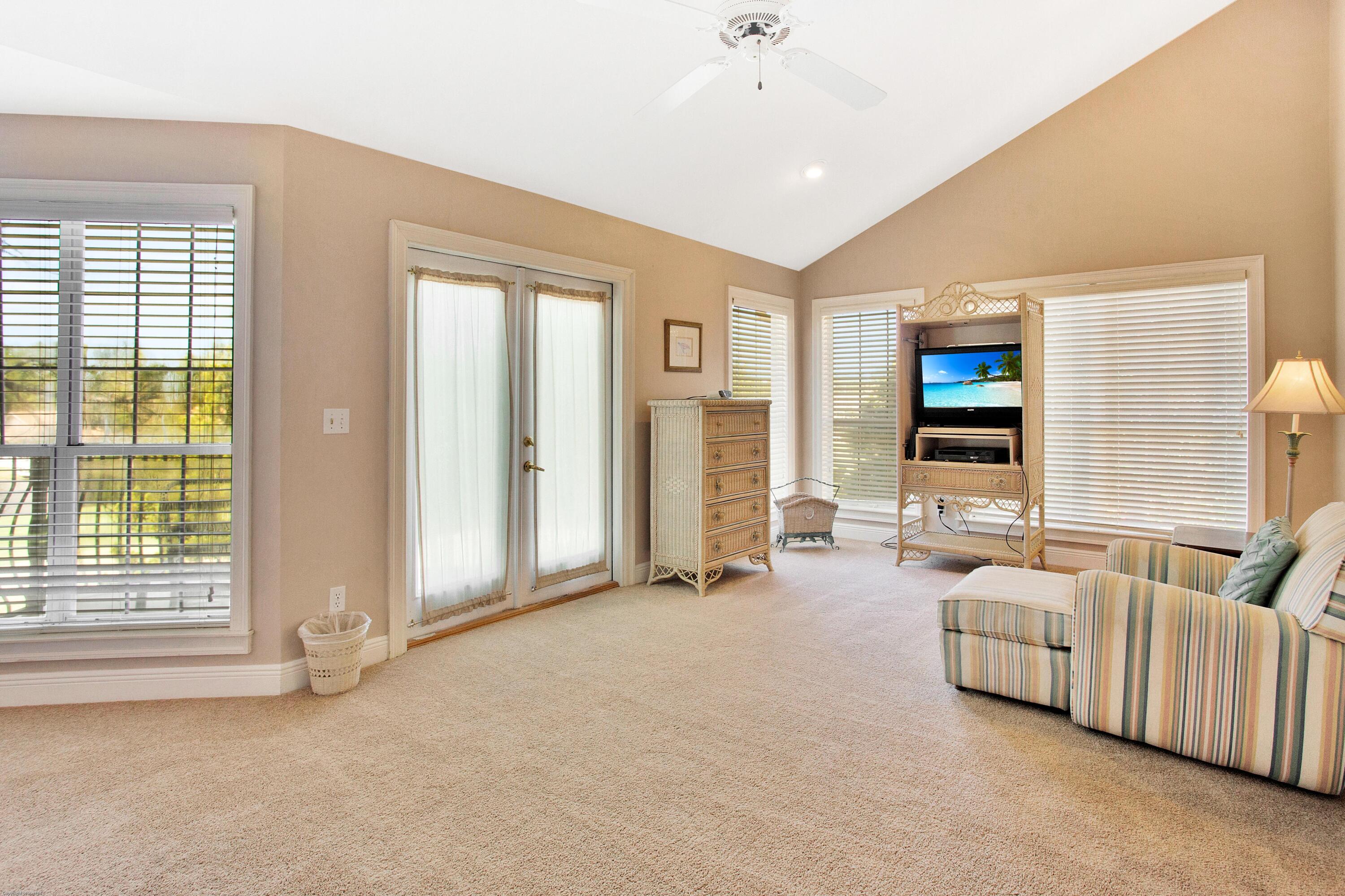 71 Vantage Point Miramar Beach, FL 32550 - Photo 15 of 36 a living room with furniture and windows