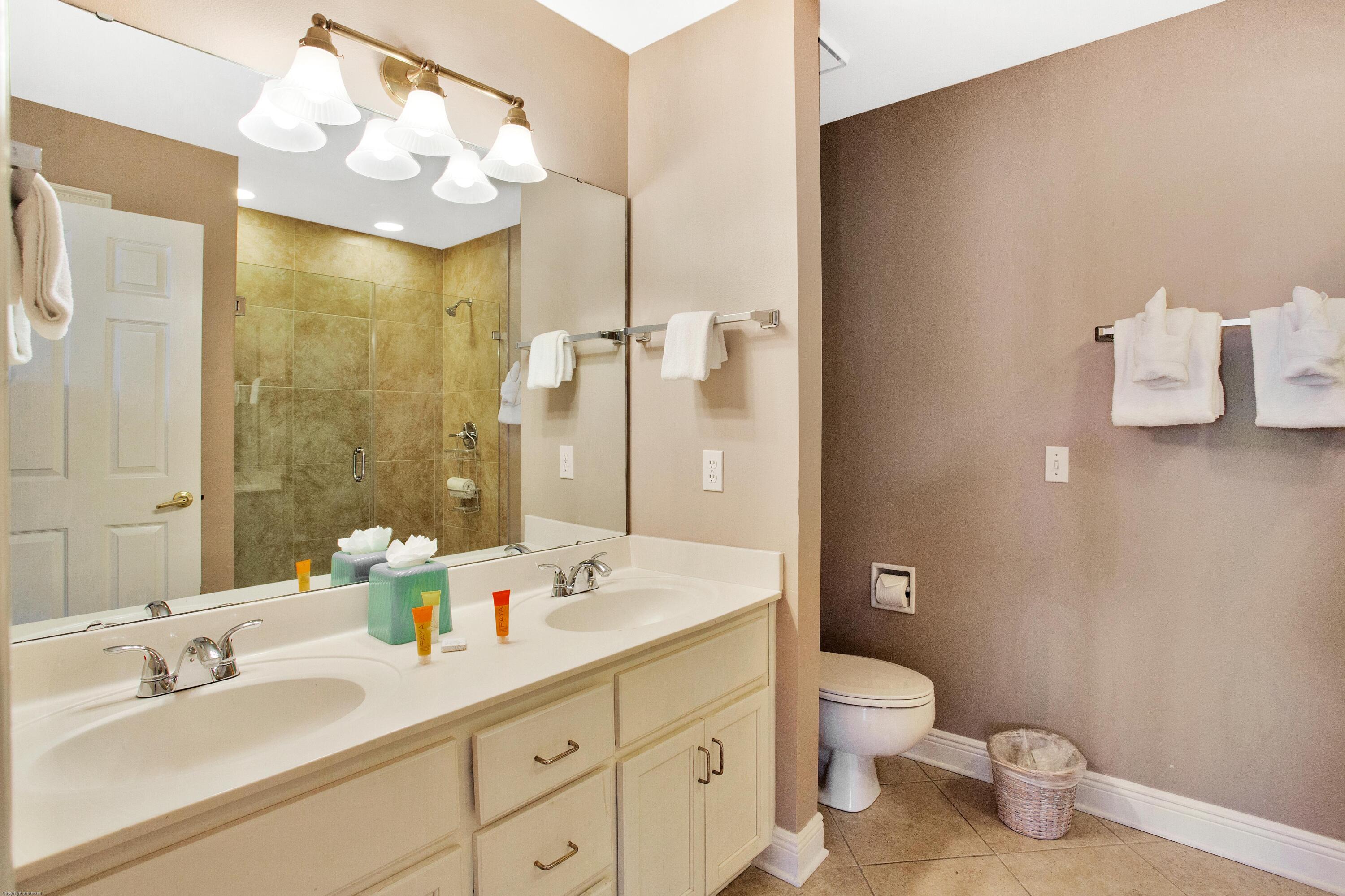 71 Vantage Point Miramar Beach, FL 32550 - Photo 16 of 36 a bathroom with a sink a toilet and shower