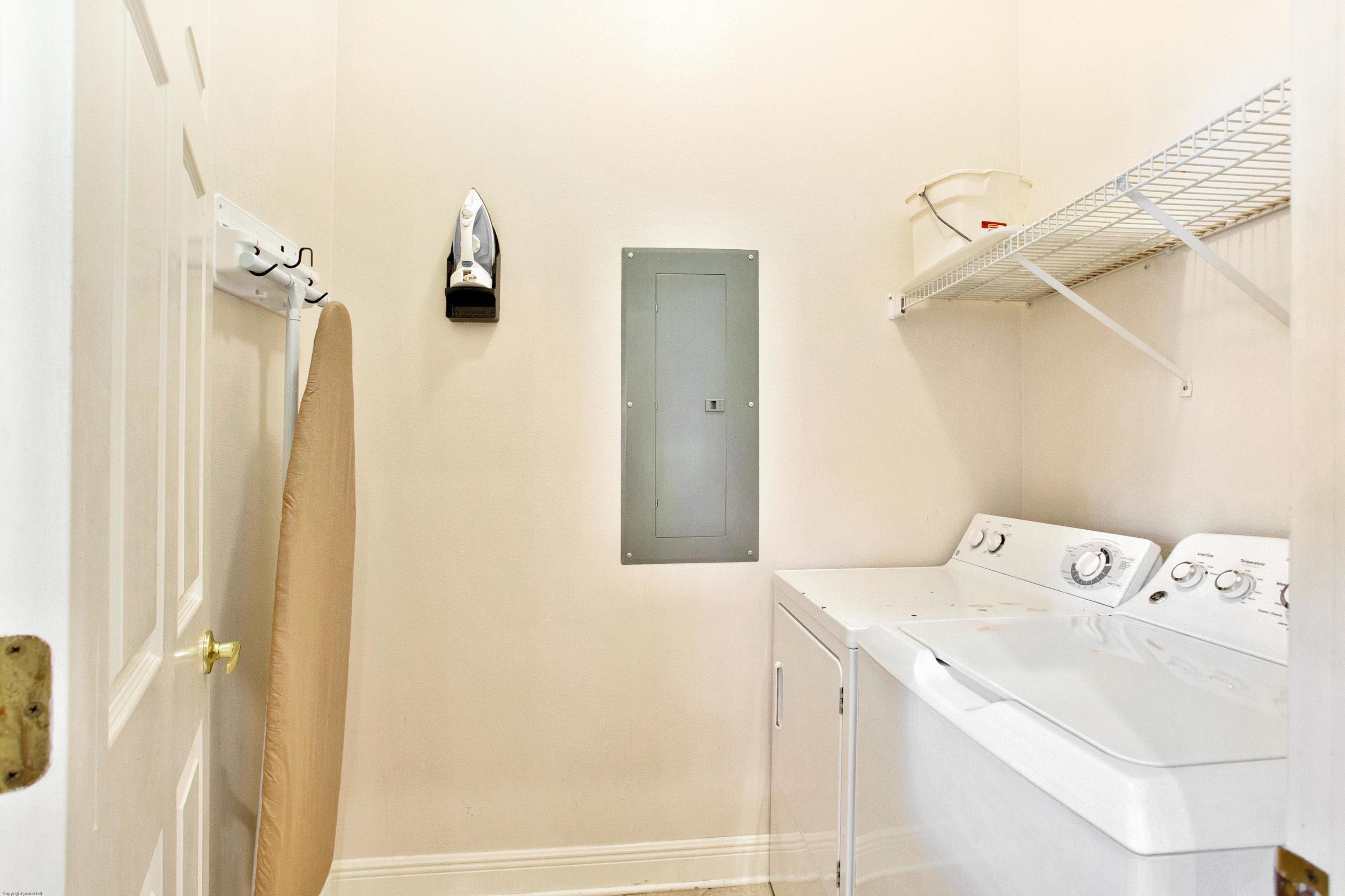 71 Vantage Point Miramar Beach, FL 32550 - Photo 19 of 36 a utility room with dryer and washer