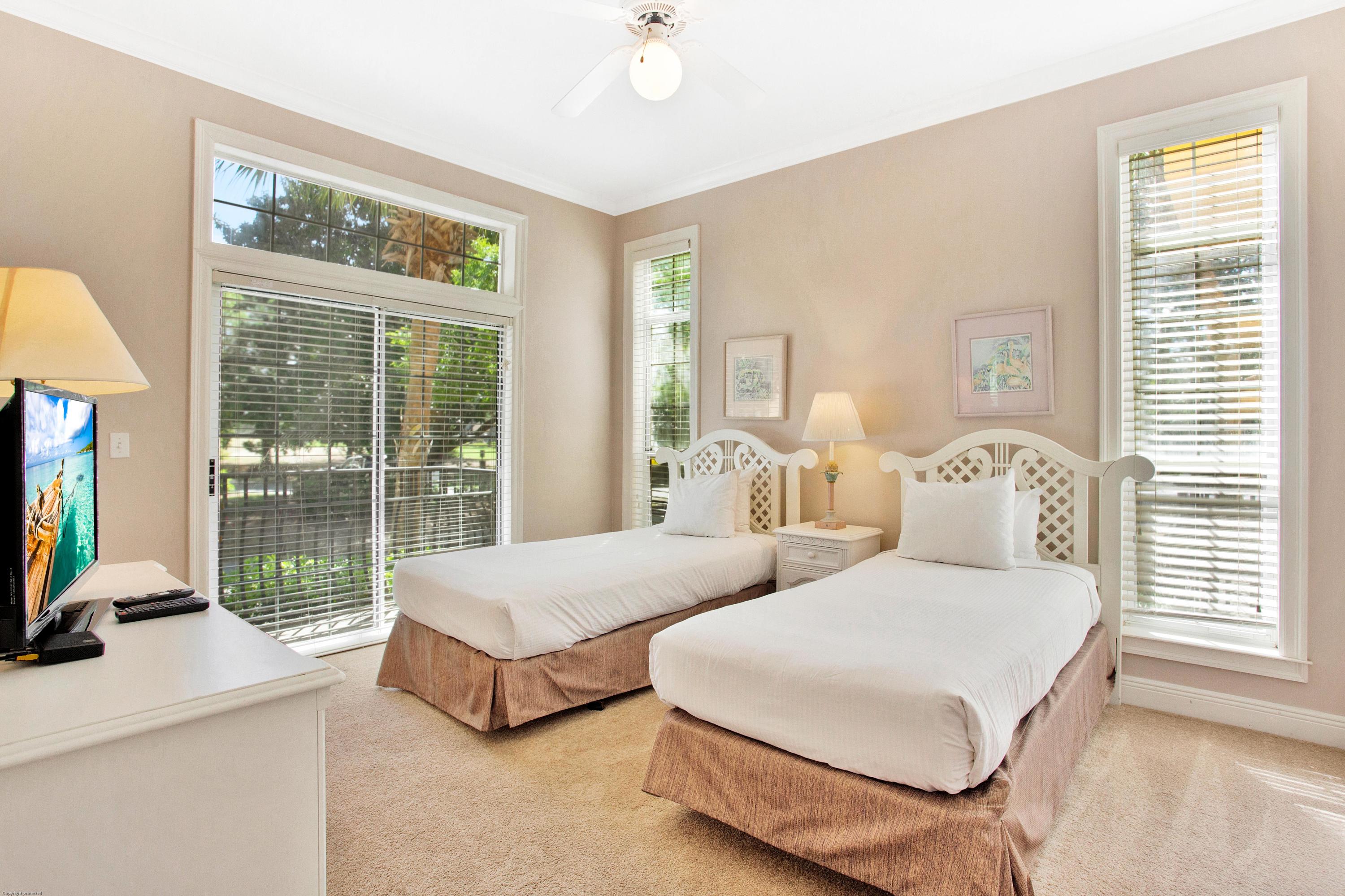 71 Vantage Point Miramar Beach, FL 32550 - Photo 20 of 36 a spacious bedroom with two beds and large window