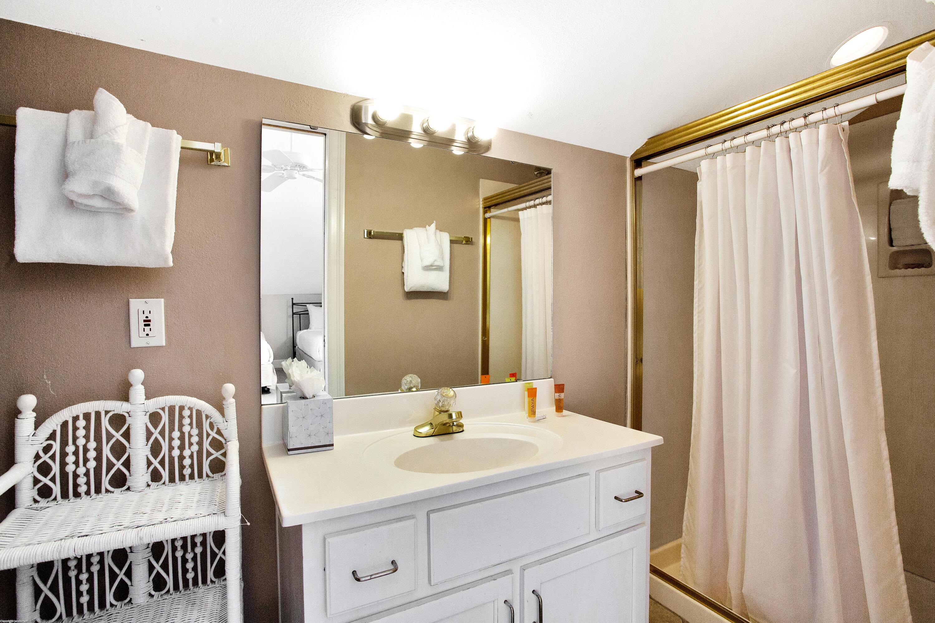 71 Vantage Point Miramar Beach, FL 32550 - Photo 26 of 36 a en suite bathroom with a sink and a mirror