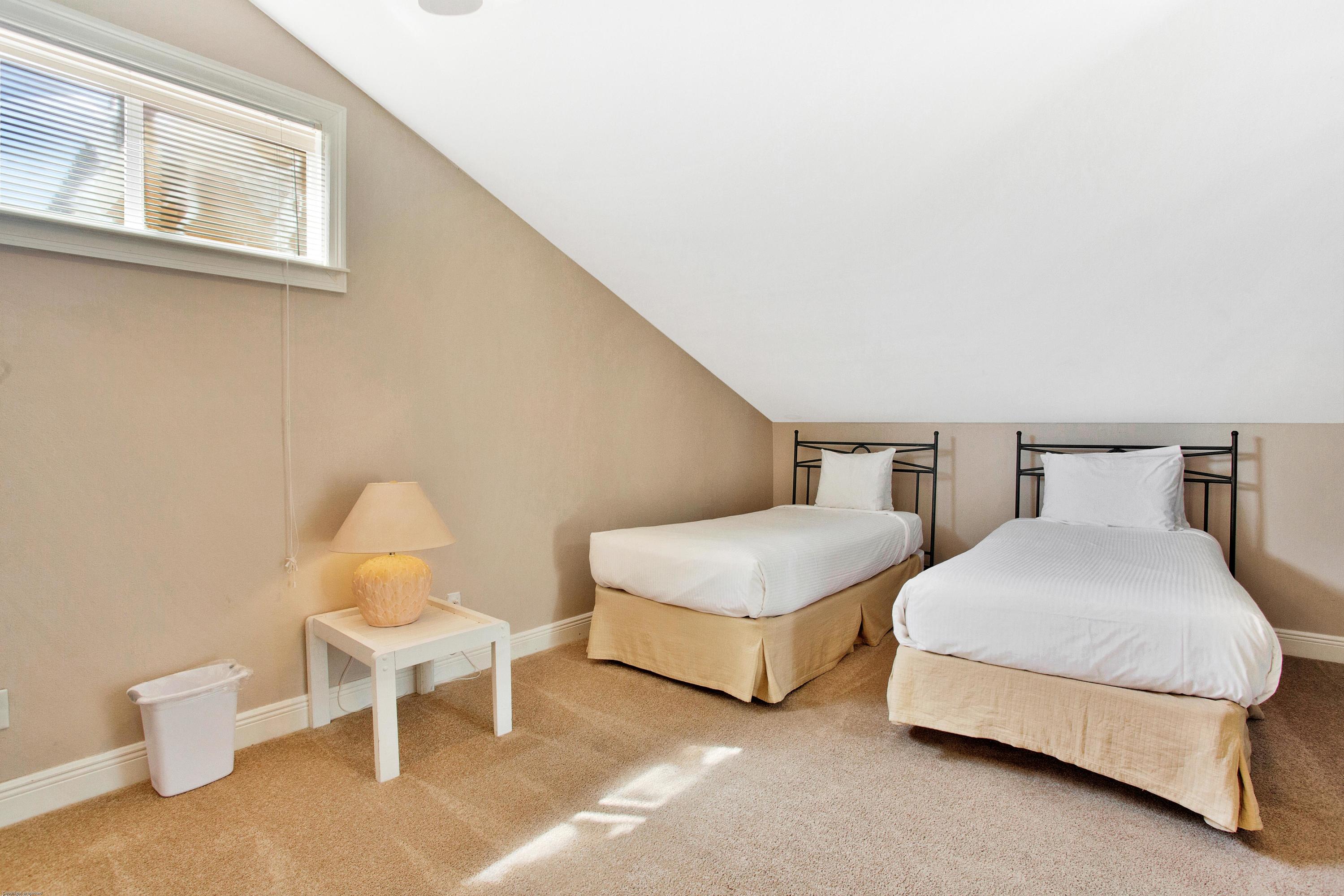 71 Vantage Point Miramar Beach, FL 32550 - Photo 27 of 36 a bedroom with two beds and painting on the wall