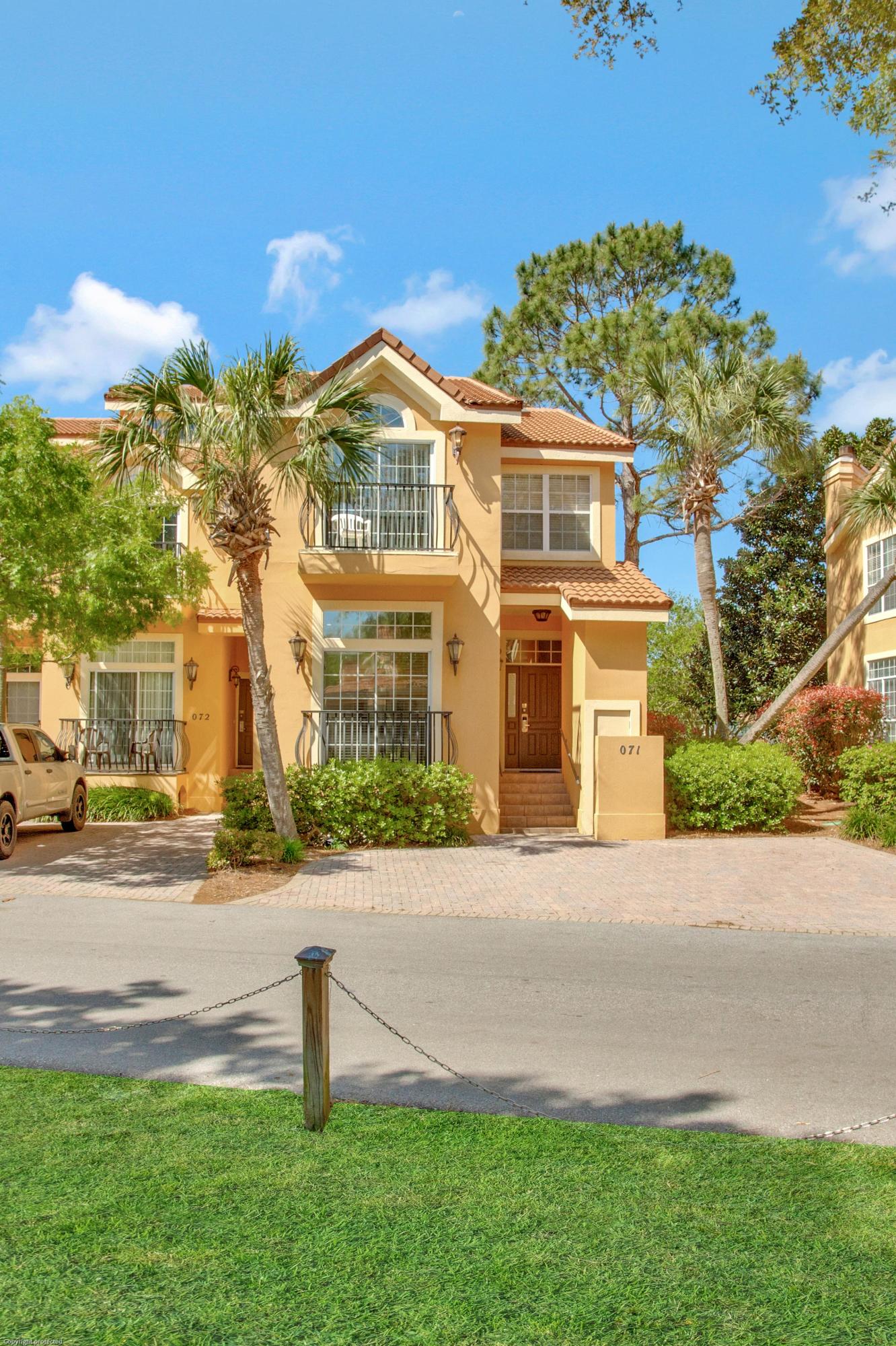 71 Vantage Point Miramar Beach, FL 32550 - Photo 36 of 36 a front view of a house with a yard