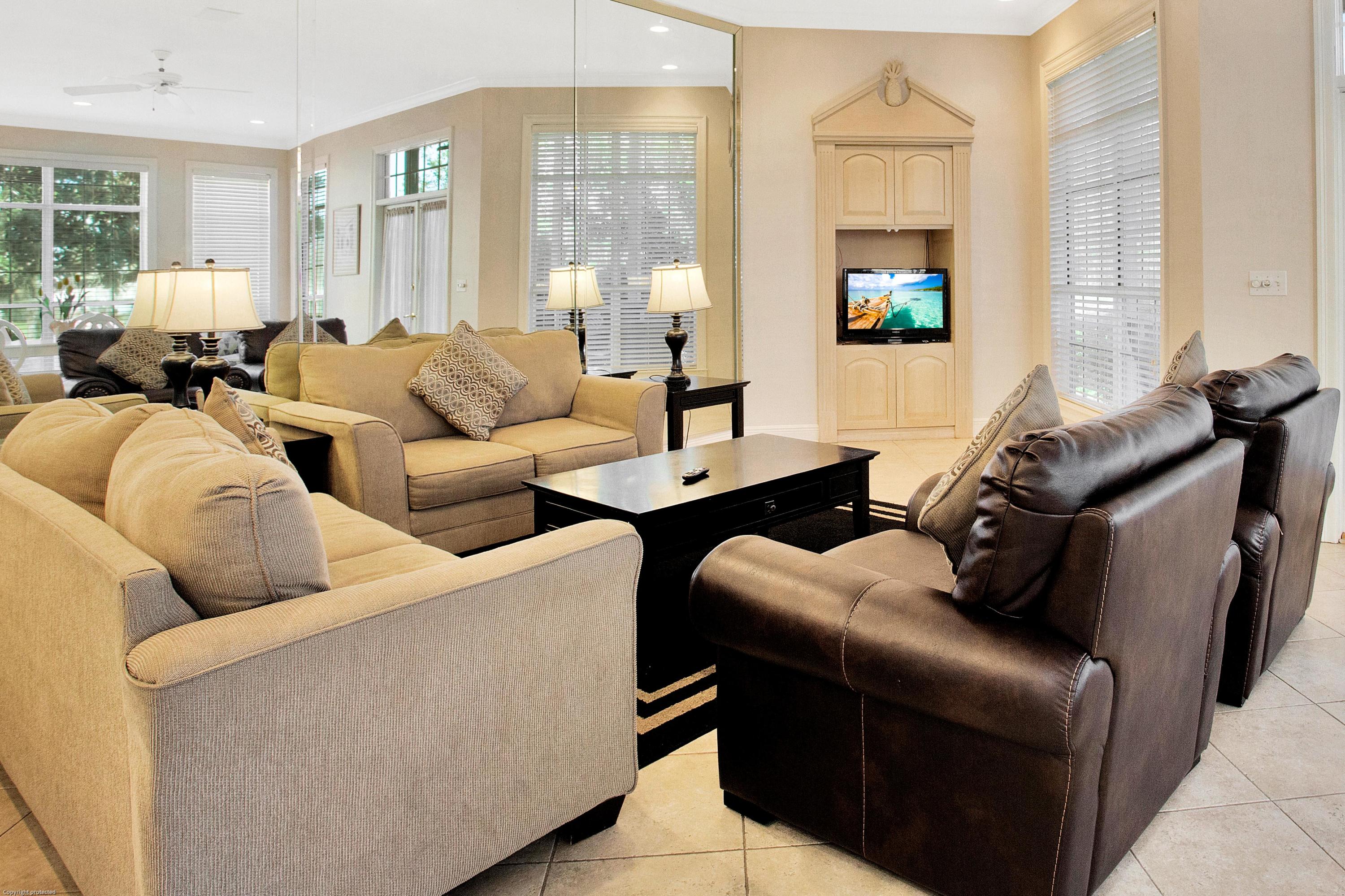 71 Vantage Point Miramar Beach, FL 32550 - Photo 7 of 36 a living room with furniture and a flat screen tv