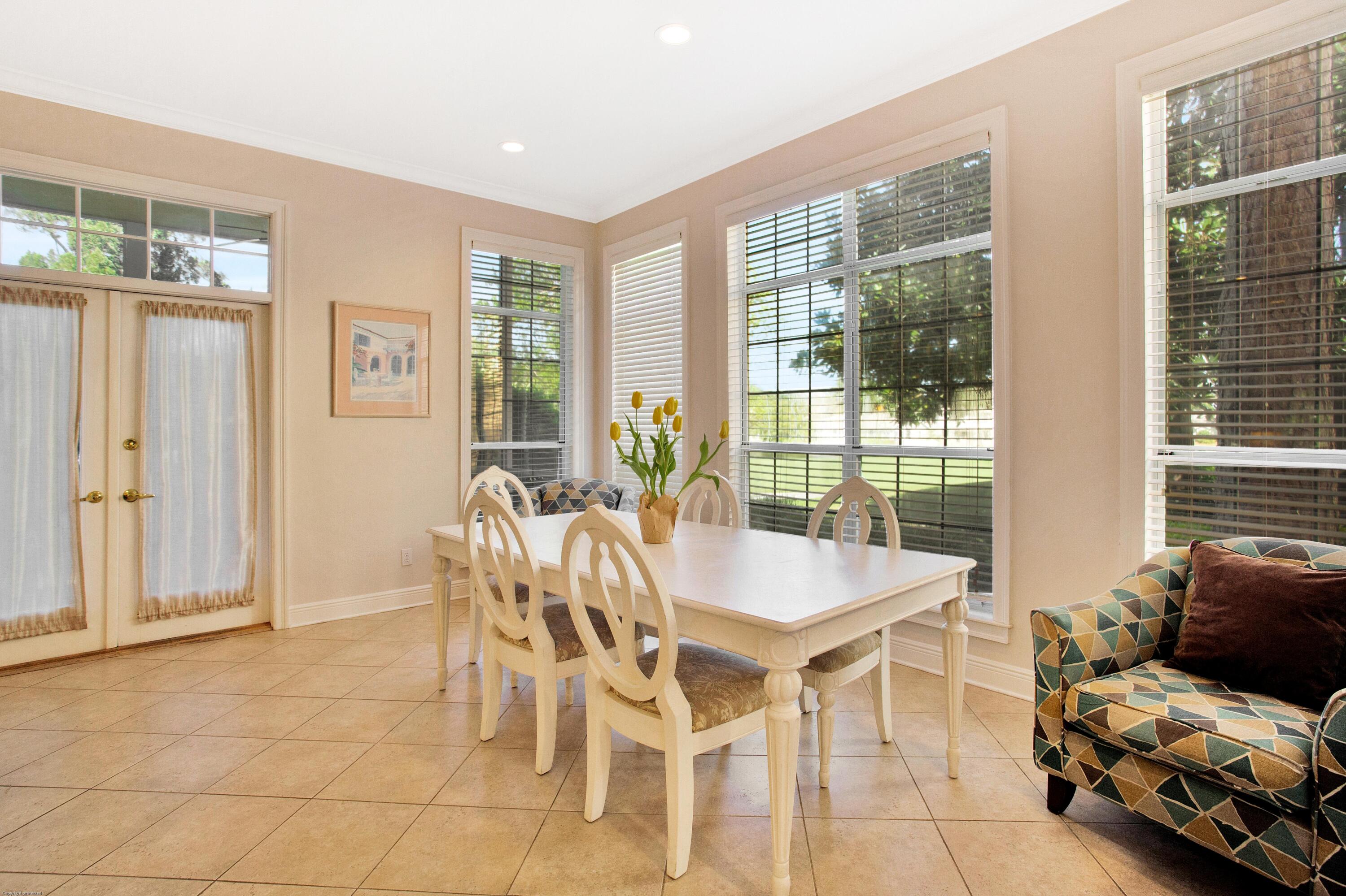 71 Vantage Point Miramar Beach, FL 32550 - Photo 8 of 36 a view of a dining room with furniture and windows