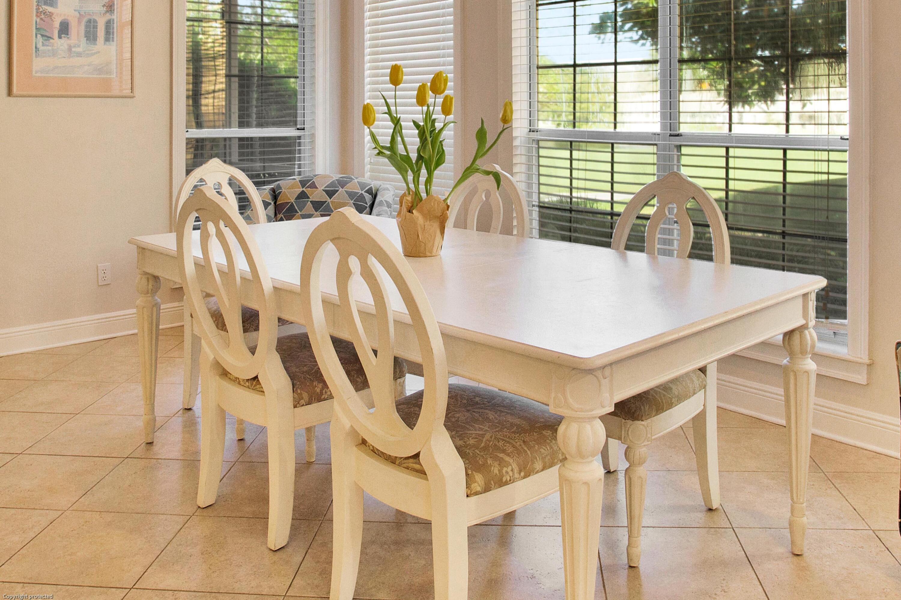 71 Vantage Point Miramar Beach, FL 32550 - Photo 9 of 36 a view of a dining room with furniture and wooden floor