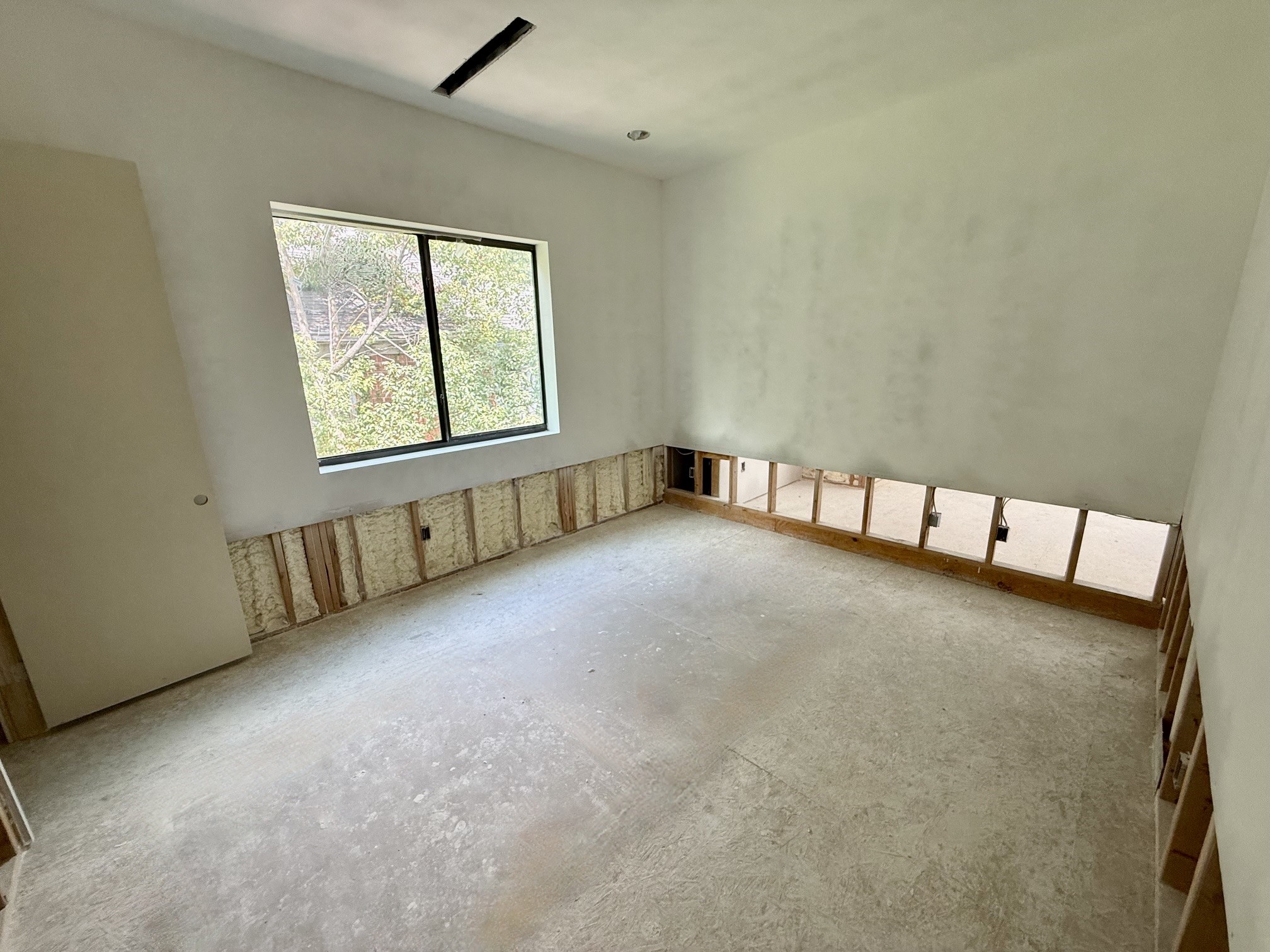 1701 Banks Street Houston, TX 77098 - Photo 16 of 50 an empty room with windows