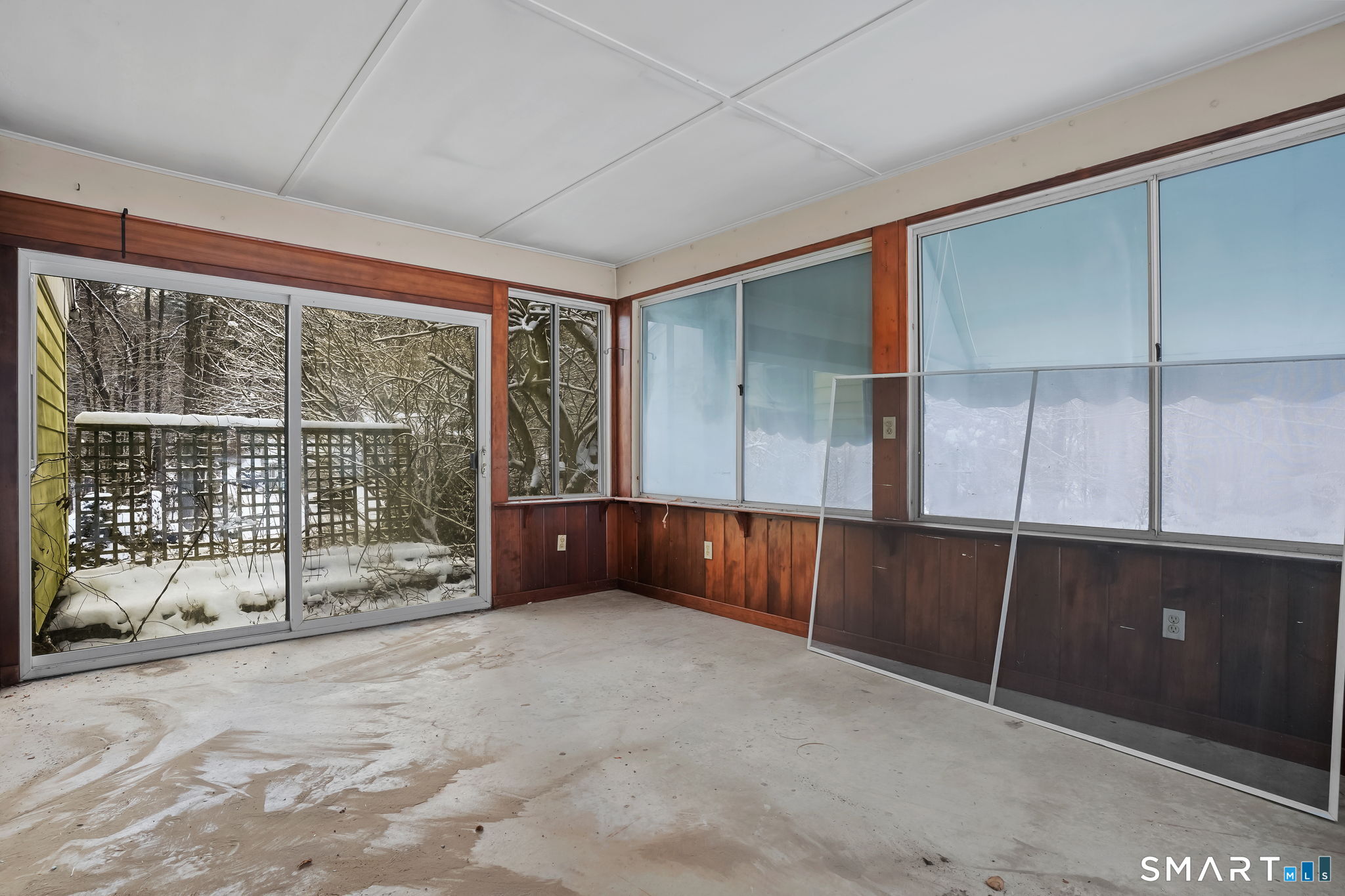 10 Pasture Lane Simsbury, CT 06092 - Photo 11 of 40 an empty room with sliding door and wooden floor