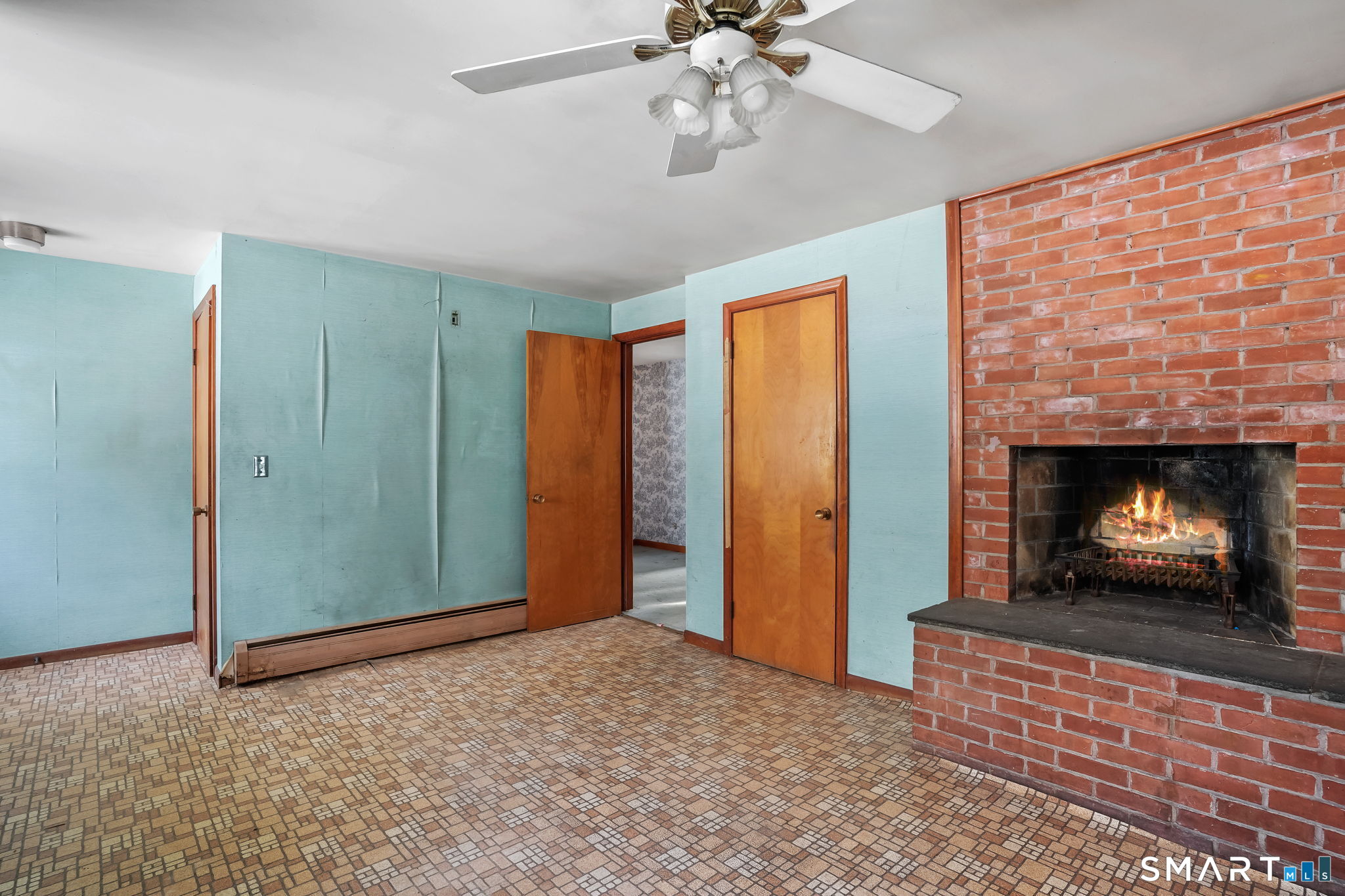 10 Pasture Lane Simsbury, CT 06092 - Photo 17 of 40 a view of an empty room fire place and a fireplace