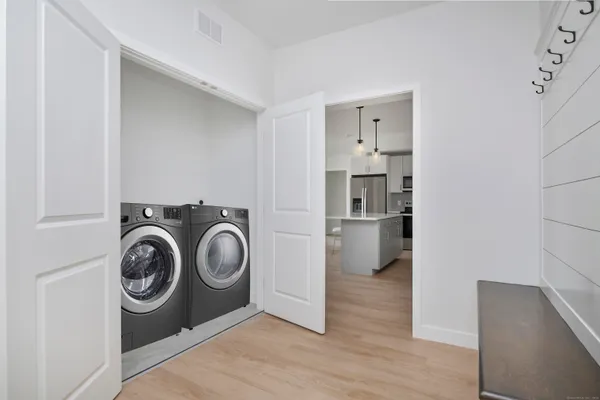 a view of washer and dryer in a utility room