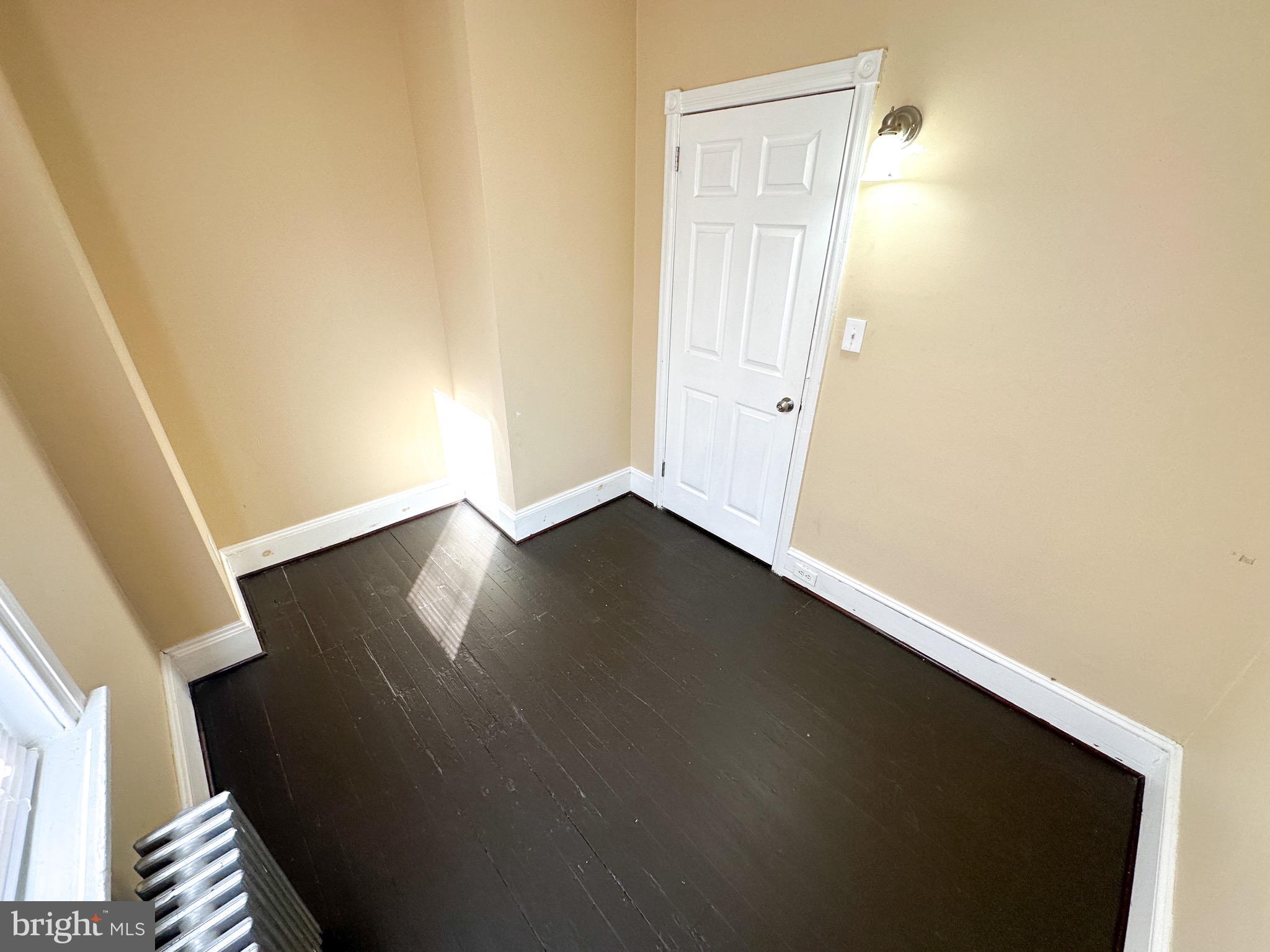 437 Markle Street Philadelphia, PA 19128 - Photo 13 of 20 an empty room with wooden floor