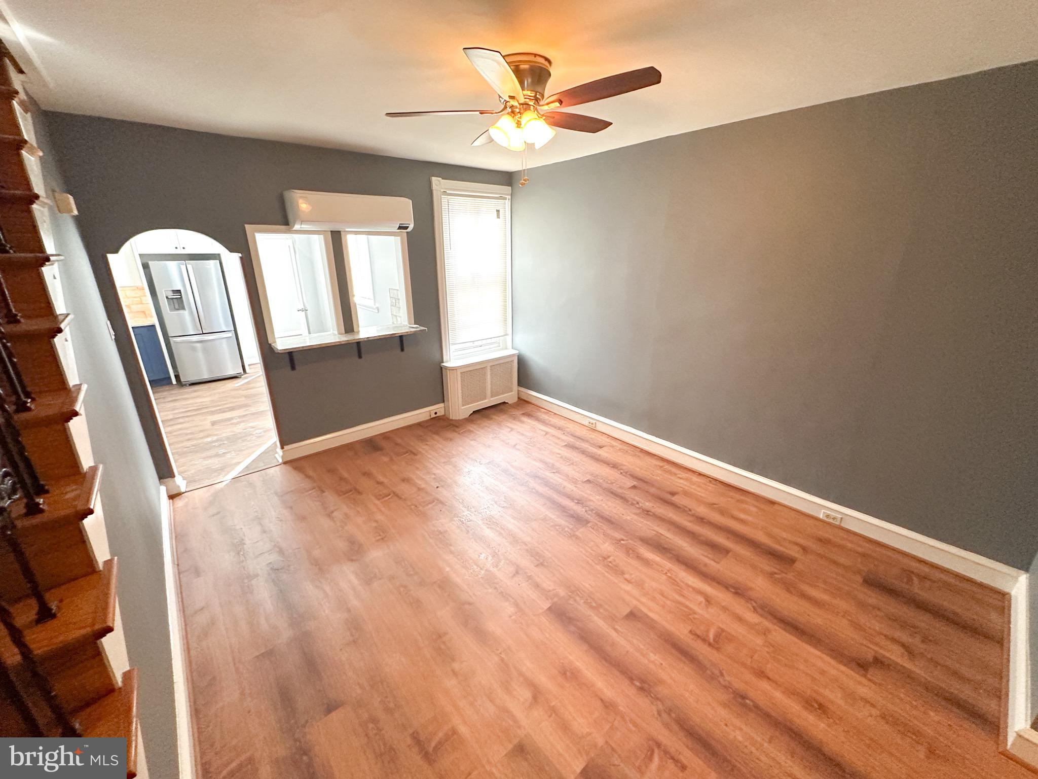 437 Markle Street Philadelphia, PA 19128 - Photo 5 of 20 wooden floor in an empty room with a window