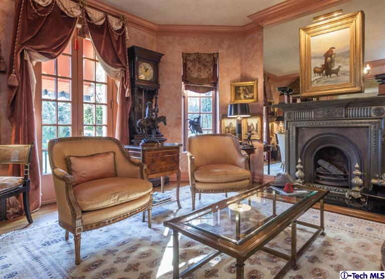 1126 Hillcrest Avenue Pasadena, CA 91106 - Photo 13 of 67 a living room with furniture a fireplace and a large window