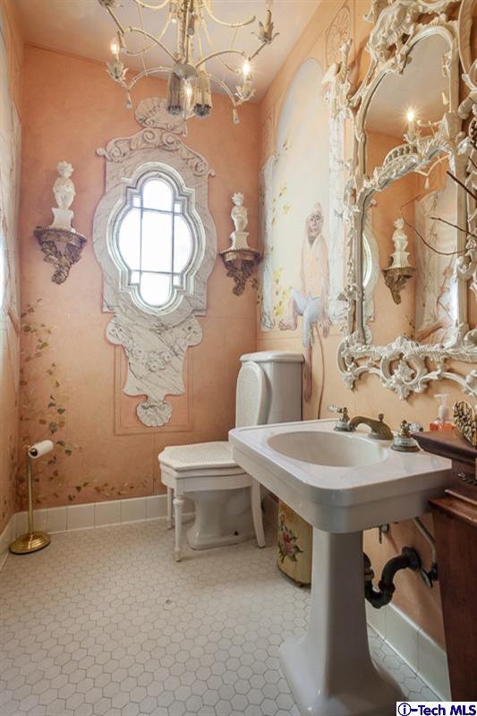 1126 Hillcrest Avenue Pasadena, CA 91106 - Photo 14 of 67 a bathroom with a sink a mirror and bathtub