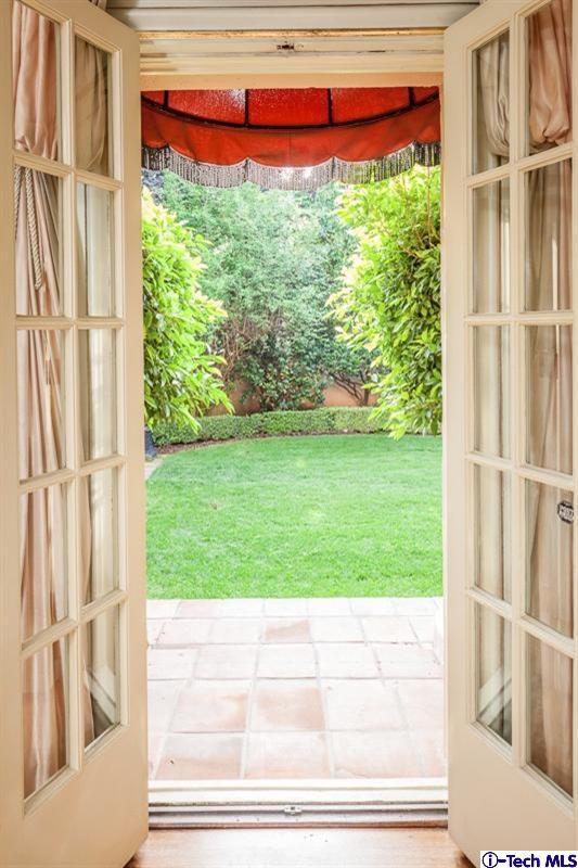 1126 Hillcrest Avenue Pasadena, CA 91106 - Photo 18 of 67 a view of a porch with a yard