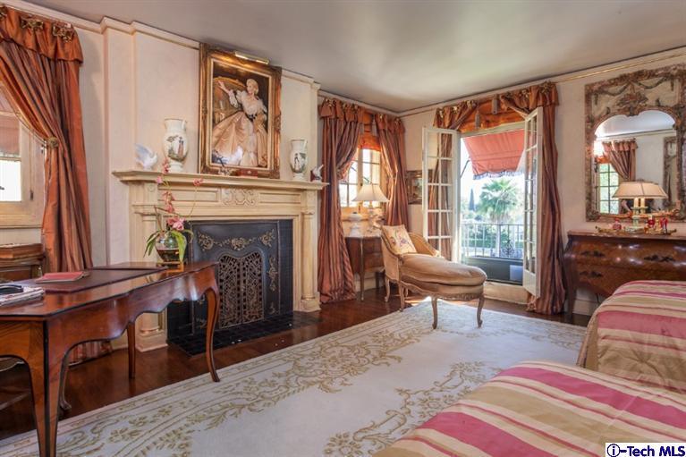 1126 Hillcrest Avenue Pasadena, CA 91106 - Photo 28 of 67 a living room with furniture and a fireplace