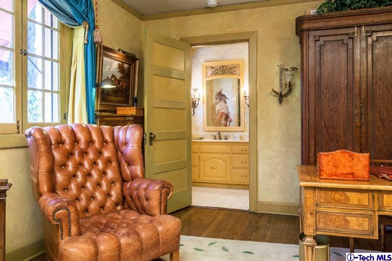 1126 Hillcrest Avenue Pasadena, CA 91106 - Photo 41 of 67 a bedroom with a bed and wooden floor