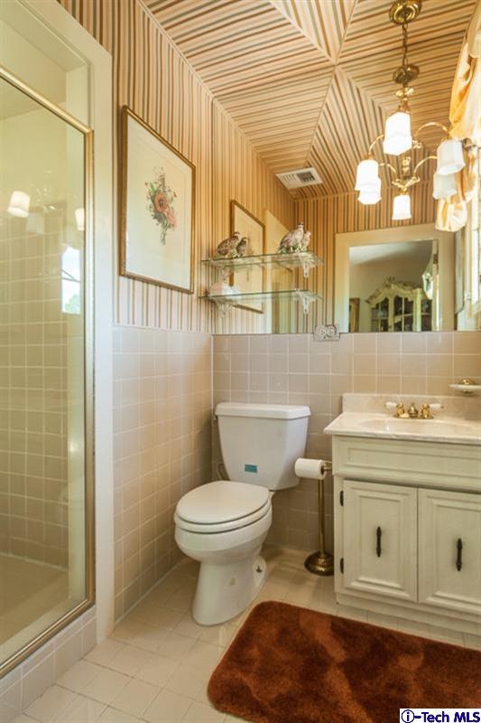 1126 Hillcrest Avenue Pasadena, CA 91106 - Photo 44 of 67 a bathroom with a sink toilet and shower