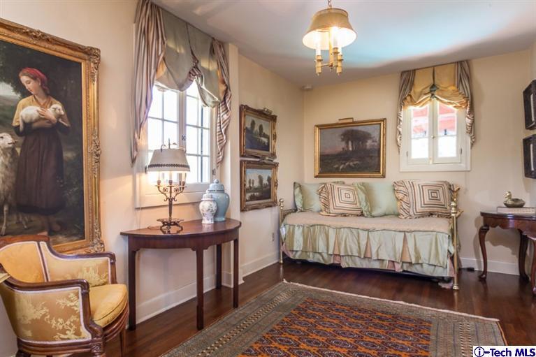 1126 Hillcrest Avenue Pasadena, CA 91106 - Photo 45 of 67 a spacious bedroom with two beds and a chandelier