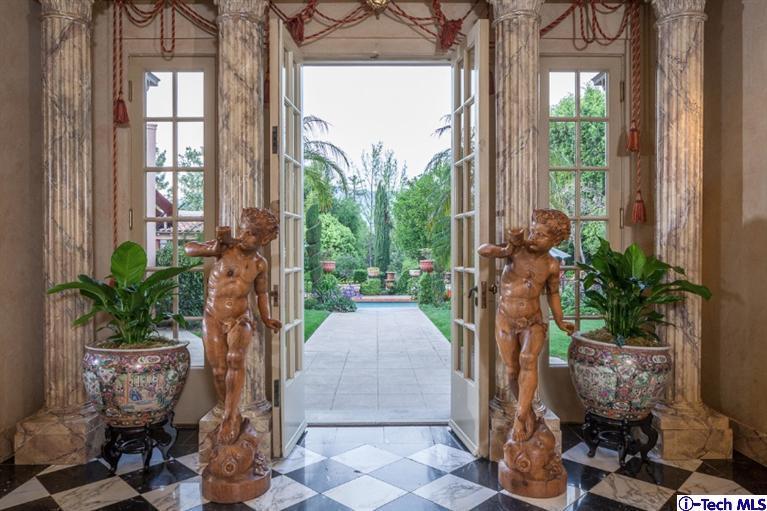 1126 Hillcrest Avenue Pasadena, CA 91106 - Photo 6 of 67 a potted plant sitting in front of a house