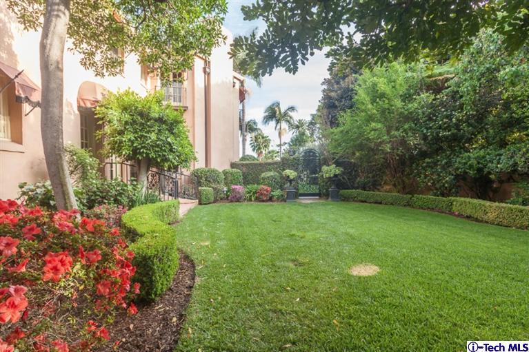 1126 Hillcrest Avenue Pasadena, CA 91106 - Photo 60 of 67 a view of a garden with a fountain