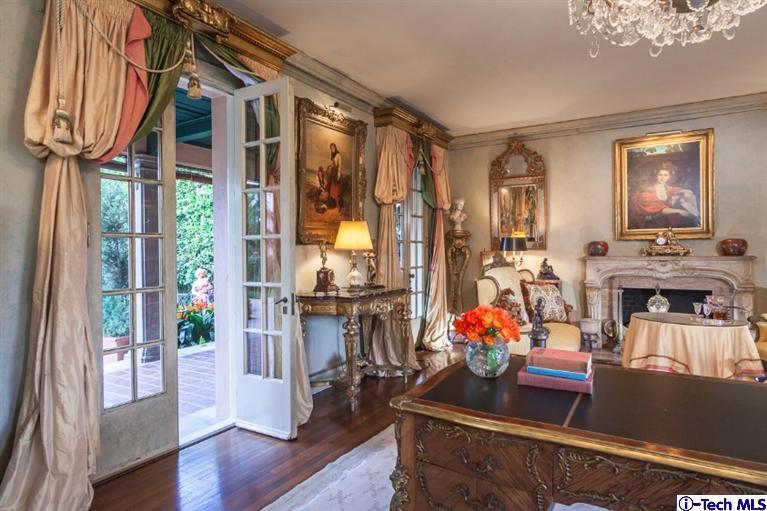 1126 Hillcrest Avenue Pasadena, CA 91106 - Photo 9 of 67 a living room filled with furniture and a potted plant