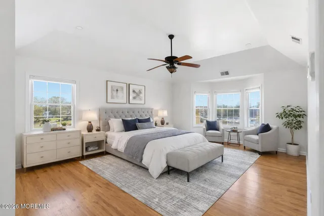 a bed room with a bed and a couch