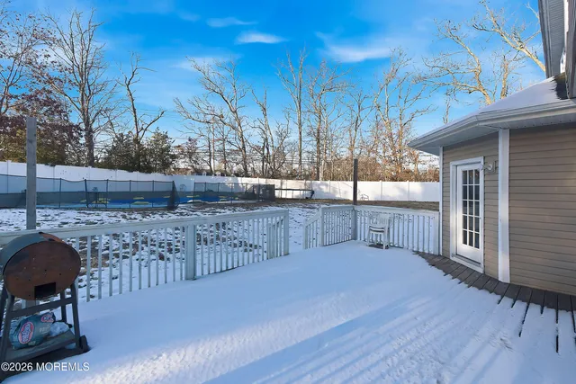 a view of a chairs and table in the patio