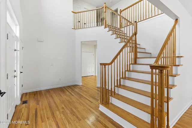 a view of entryway with wooden floor