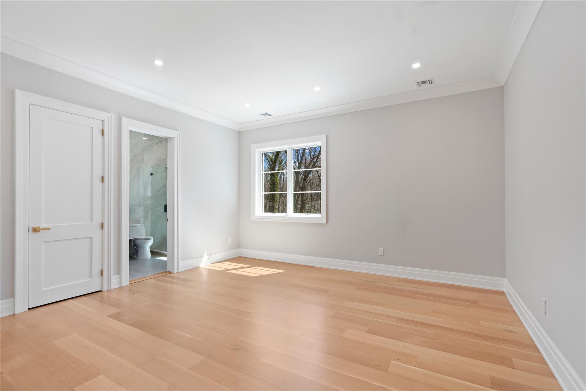 20 Knollwood Road Muttontown, NY 11545 - Photo 26 of 41 with en-suite full bathroom and walk-in closet