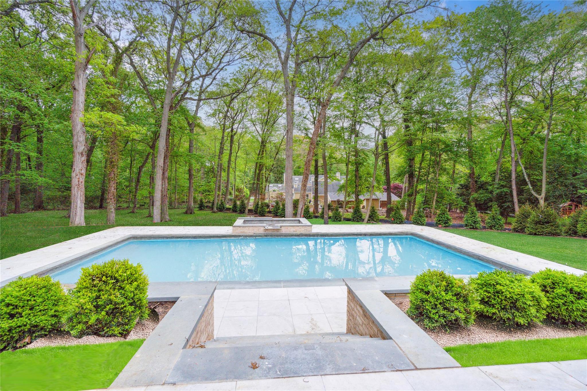 20 Knollwood Road Muttontown, NY 11545 - Photo 37 of 41 Outdoor pool with an in-ground hot tub