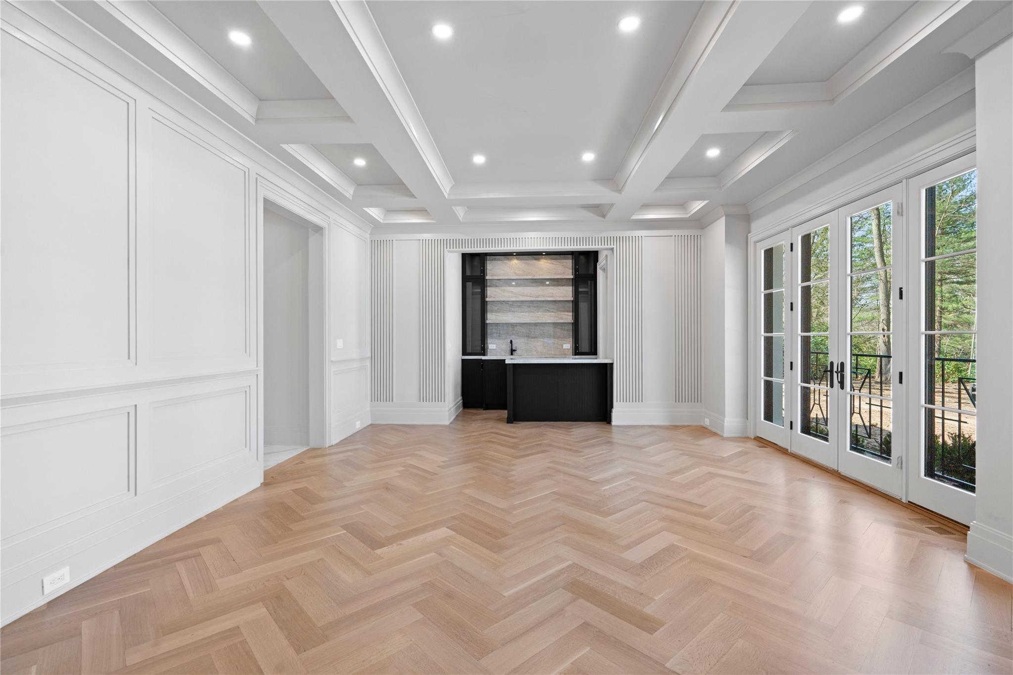 20 Knollwood Road Muttontown, NY 11545 - Photo 6 of 41 Formal dining room with herringbone flooring and wet bar