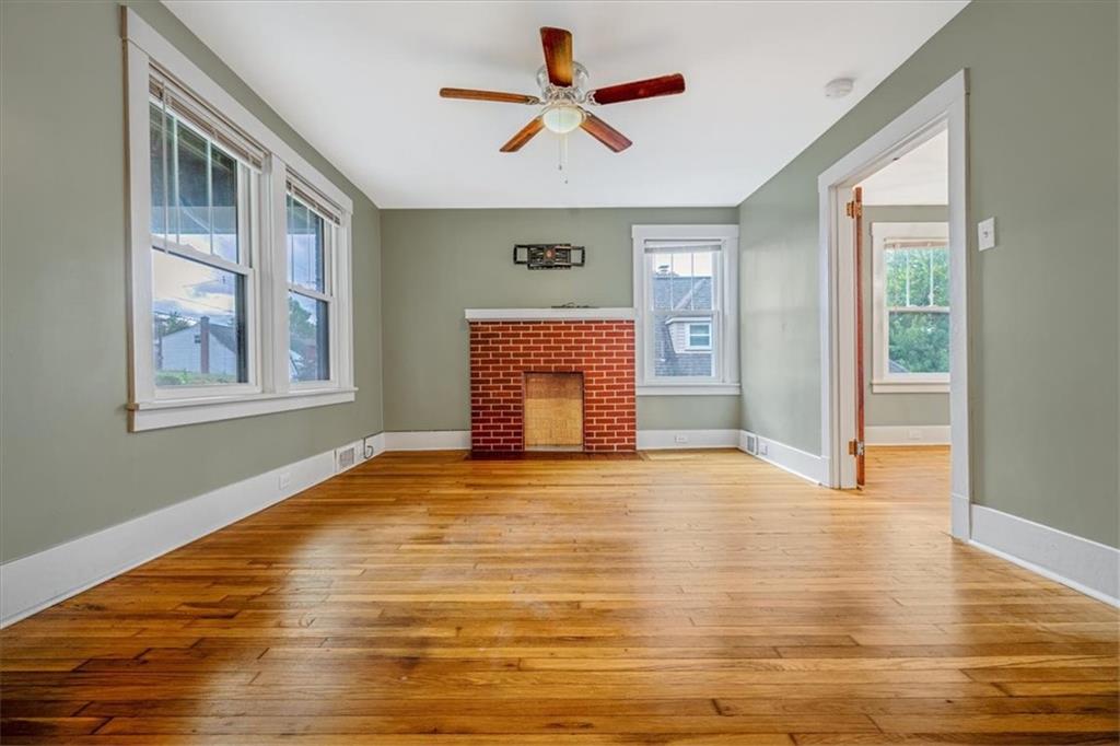 200 Spring Avenue Pittsburgh, PA 15202 - Photo 13 of 43 a view of an empty room with window and chandelier fan