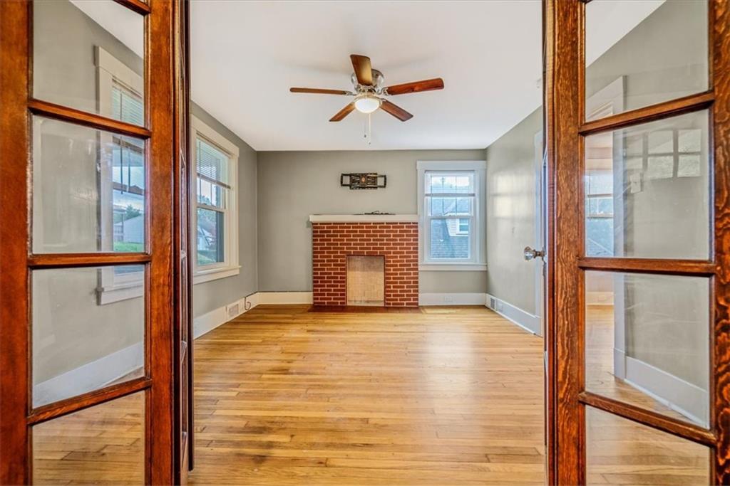 200 Spring Avenue Pittsburgh, PA 15202 - Photo 16 of 43 wooden floor in an empty room with a window