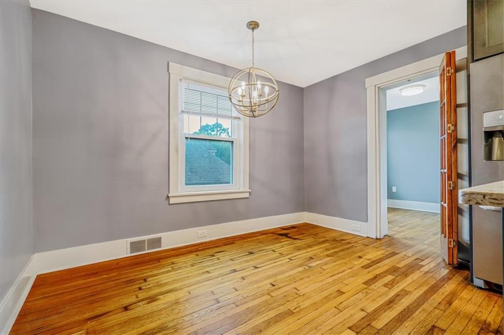 200 Spring Avenue Pittsburgh, PA 15202 - Photo 19 of 43 a view of empty room with wooden floor and fan