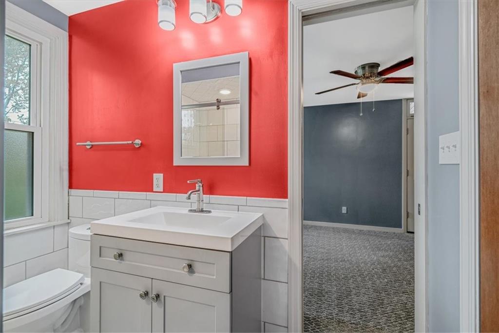 200 Spring Avenue Pittsburgh, PA 15202 - Photo 29 of 43 a bathroom with a sink vanity and a mirror