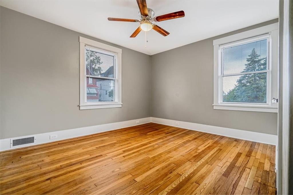 200 Spring Avenue Pittsburgh, PA 15202 - Photo 32 of 43 a view of empty room with wooden floor and fan